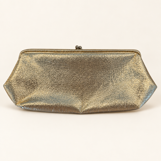 A metallic gold clutch purse with a textured, crinkled finish and a small metal clasp at the top, shown against a plain off-white background.